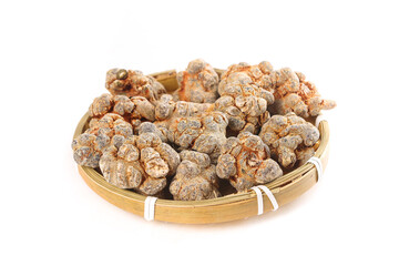 Chinese Panax Pseudoginseng Roots Wenshan Notoginseng Herbal Medicine in Bamboo Basket on White...