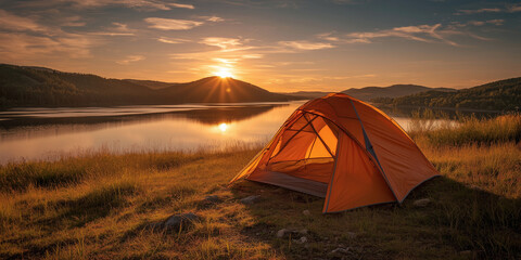 Outdoor camping tent near a peaceful lake