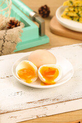 Farm Fresh Free Range Eggs with Golden Yolks on Rustic White Wooden Background