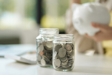 Business woman think of the concept of saving money.