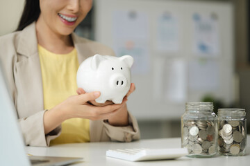 Business woman think of the concept of saving money.