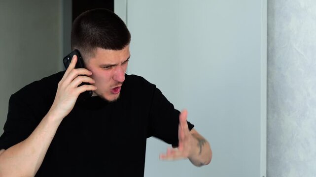 An angry and emotionally unstable man shouts at his interlocutor in a telephone conversation.
Work conflict between people.
Negative emotions at work due to stress and fatigue.
Explosion of emotions