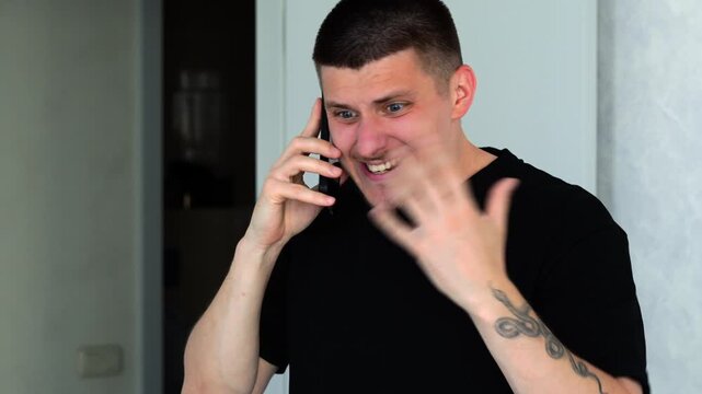 An angry and emotionally unstable man shouts at his interlocutor in a telephone conversation.
Work conflict between people.
Negative emotions at work due to stress and fatigue.
Explosion of emotions