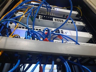 Server Rack with  Ethernet Cables on Datacenter