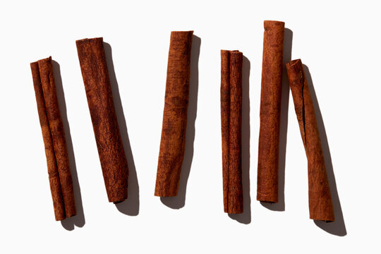 Cinnamon sticks on white background