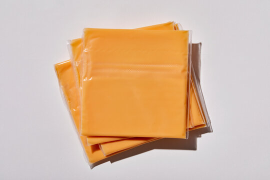 Overhead view of stack of processed cheese slices