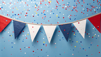 Patriotic red white blue bunting flags with star confetti scattered on light blue background...
