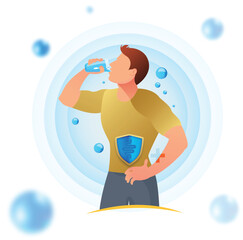 An attractive young man is drinking water from a glass. Fitness and health.