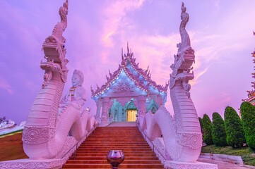 The Naga staircases to the Ordination Hall and Guan Yin statue, Wat Huai Pla Kang in Chiang Rai, Thailand