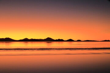 Sunset over the Salar de Uyuni, the world's largest salt flat, Bolivia