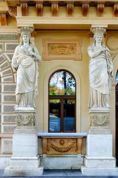 Window flanked by caryatids