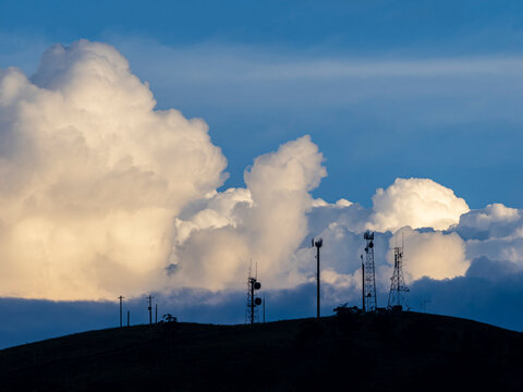 Storm clouds behind telecommunications towers