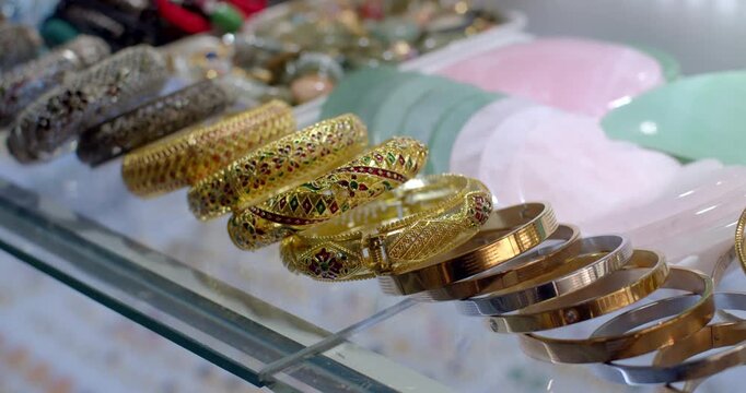 Gold and black bracelet.Bracelets with different patterns are popular as souvenirs.