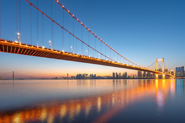 Wuhan skyline and Yangtze river with supertall skyscraper under construction in Wuhan Hubei China.