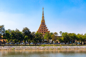 Naklejka premium Phra Mahathat Kaen Nakhon pagoda buddhist temple and lake Thailand.