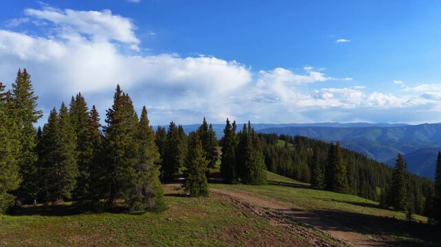 Little Annie Basin Trailhead AJAX top of Aspen Mountain aerial drone Independence Pass snow covered Rocky Mountains spring summertime morning sunny blue sky Silver Bell Trailhead Richmond Hill forward