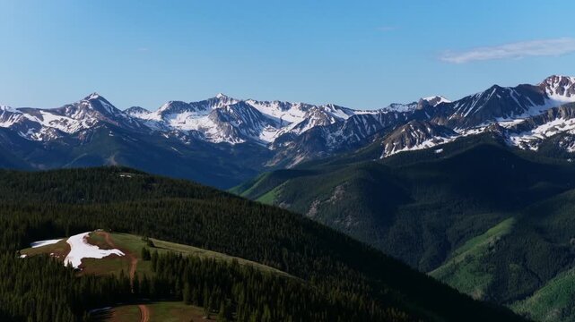 Conundrum Castle Peak AJAX Aspen Mountain Little Annie Basin Trailhead aerial drone Castle Creek melting snow covered Rocky Mountains Ashcroft Spring summer morning sunny blue sky circle right
