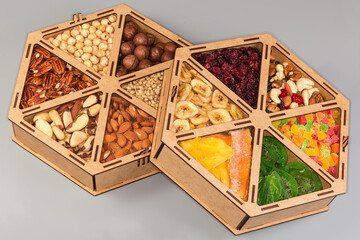 Sets of nuts and dried fruits in two compartment boxes