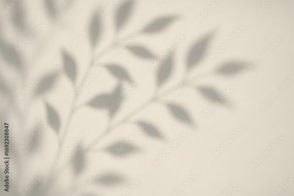 Poster blurred shadows of leaves on a plain beige background creating a beautiful abstract design, perfect 