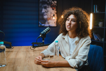 Content creator recording podcast in professional studio