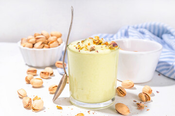 Vegan alternative non-dairy pistachio heavy cream, pistachio pudding or yogurt