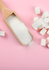 white sugar on the table on a light background close-up. Vertical photo format