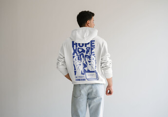 Mockup Of Man Wearing Customized Hoodie, Back