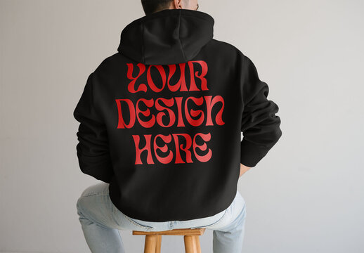 Mockup Of Man Wearing Customizable Hoodie, Rear View