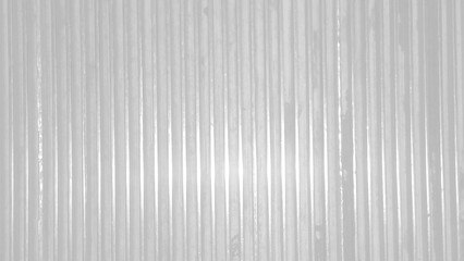 corrugated metal texture with pattern of parallel, vertical ridges.