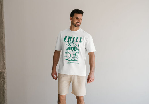 Mockup Of Man In Customized T-Shirt In Studio