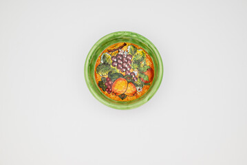 Handmade ceramic bowls from Ischia island, Italy. Colorful pottery with traditional design,...
