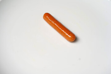 Cooked Sausage on white background. image