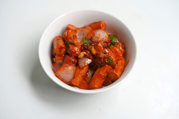 sausages devil in white bowl on white background