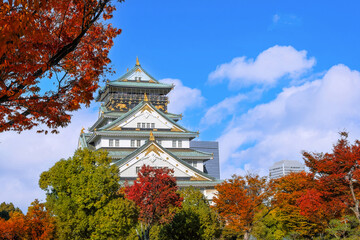 Scenic view of Osaka Castle with beautiful foliage in autumn in Osaka, Japan