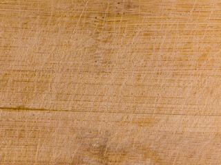 Fototapeta premium Close up wooden surface with natural grain and scratches texture