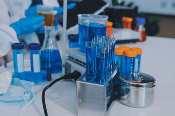 Collaboration, tablet or science with people in lab together for research or development. Innovation, tech and microscope with scientist team in clinical trial for planning or medical investigation