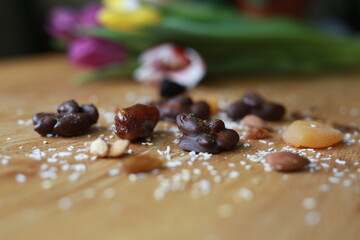 close Close-up of chocolate-covered treats with nuts and dried fruit.up of chocolate chip cookies
