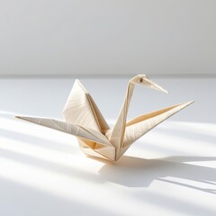 A single origami crane folded from textured paper, representing peace, mindfulness, and Japanese tradition.