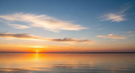 Serene Sunset over Calm Water, Painted Skies
