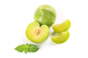 Fresh Green Plum Sliced with Mint Leaves on White Background - Healthy Fruit Display