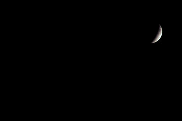 A beautiful rare blood moon on a dark night sky