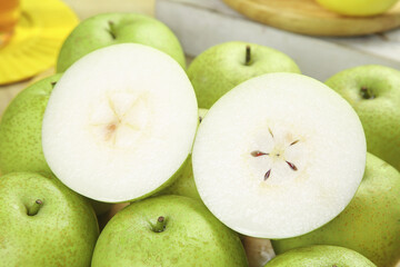Fresh Green Apples Cut in Half Showing Star Seed Pattern - Healthy Organic Fruit