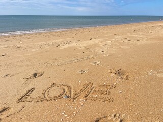 footprints on the beach love