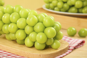 Fresh Green Grapes on Wooden Cutting Board - Healthy Organic Fruit Display