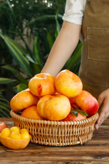 Fresh Golden Peaches from Shandong Yimeng Mountain Province in Wicker Basket - Organic Fruit Harvest