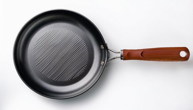 top view of nonstick flat tawa pan for roti and dosa cooking isolated on a white background