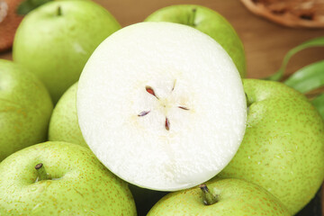 Fresh Dangshan Pears with Cross Section on Wooden Base - Asian Fruit Display
