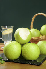 Fresh Green Pears on Slate Board with Wicker Basket - Healthy Organic Fruit Display