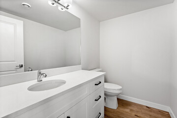 Bathroom with a white toilet and sink