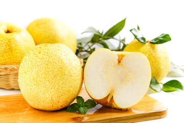 Fresh Dangshan Crown Pears from Anhui China with White Crisp Flesh on Wooden Board